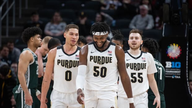 Mason Gillis, Trevion Williams and Sasha Stefanovic